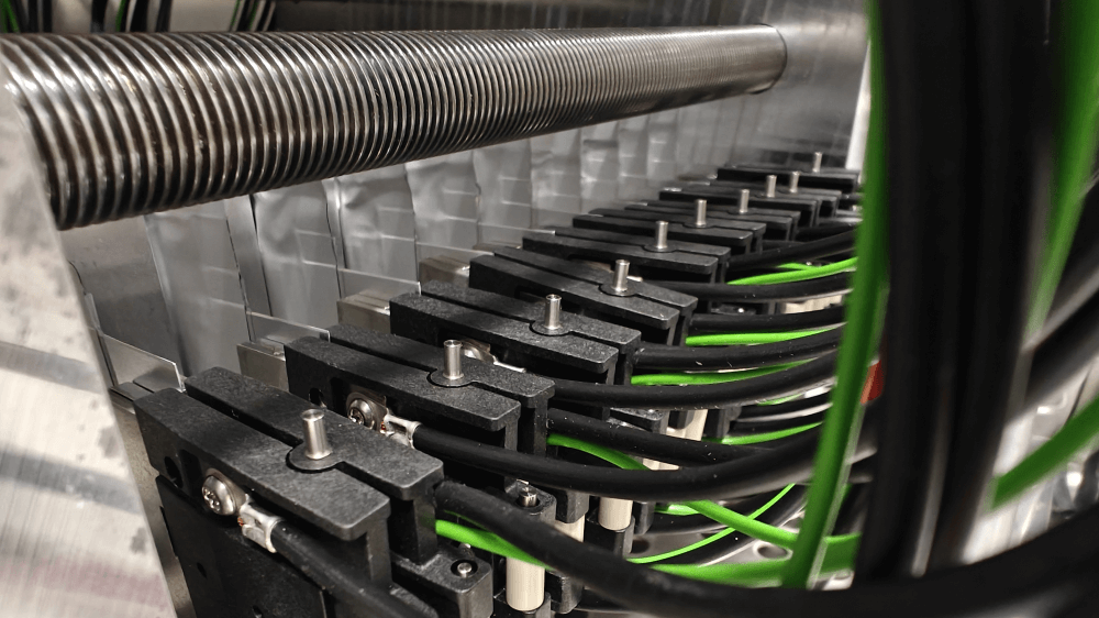 Zyklisierung unserer Pouchzellen unter definiertem mechanischen Druck.
