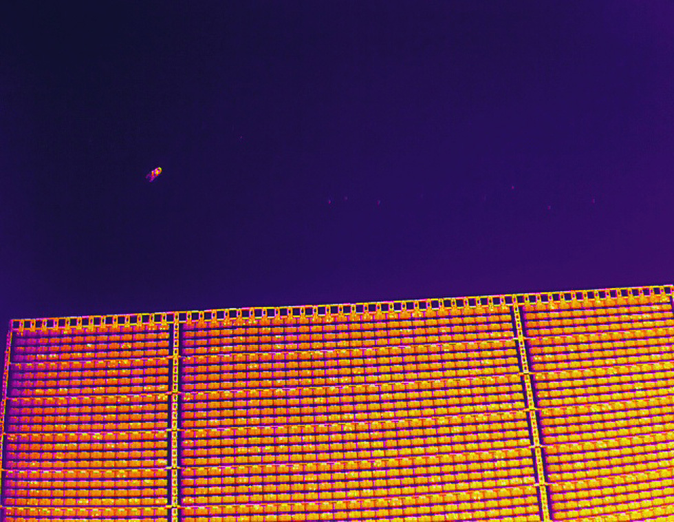 Thermographic image taken by a drone to detect faults and ensure system performance
