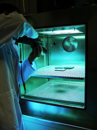 Polymer sample during UV aging in a climatic chamber