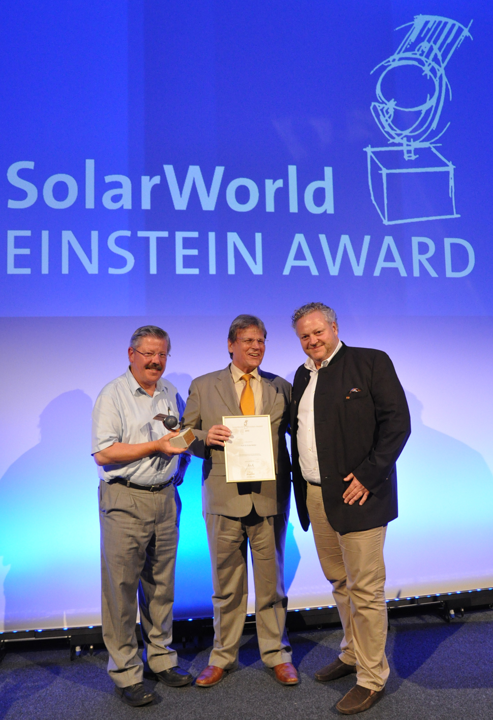 SolarWorld Einstein Award 2013: f.l.t.r. Dr. Winfried Hoffmann, laudator,Prof. Dr. Eicke R. Weber, prize winner and Dr. Frank Asbeck, CEO SolarWorld AG. 