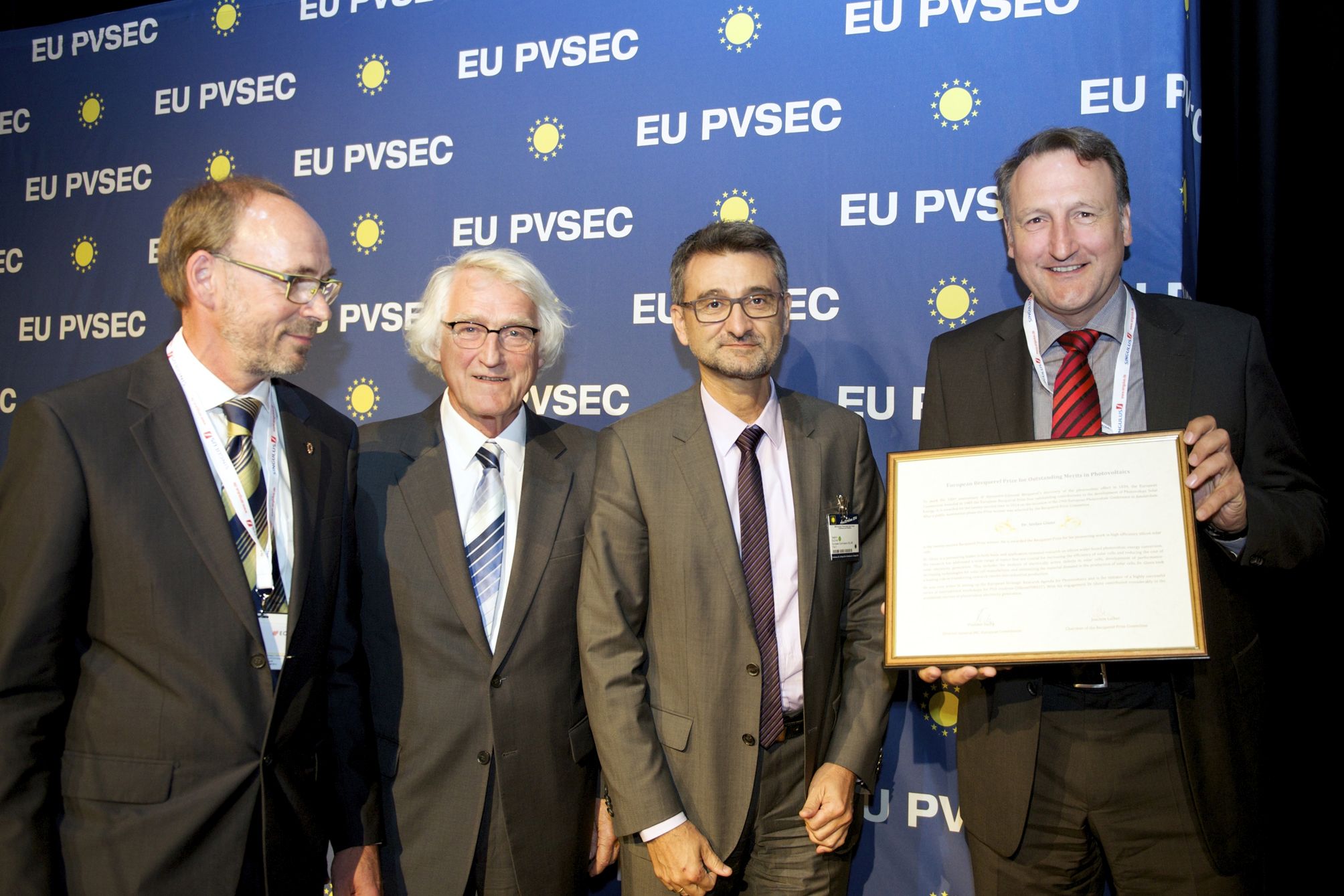 Dr. Stefan Glunz receives Becquerel Prize from left to right: Prof. Wim Sinke, Program Development Manager, ECN Solar Energy, Prof. Joachim Luther, Chairman of the Becquerel Prize committee Vladimir Sucha, Director-General JRC, European Commission, Dr. Stefan Glunz, Recipient of the Becquerel Prize 2014.