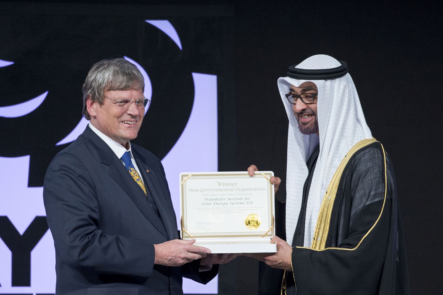Zayed Future Energy Prize 2014 awarded the Fraunhofer Institute for Solar Energy Systems ISE: Director Prof. Dr. Eicke R. Weber receives the Zayed Future Energy Prize 2014 from His Highness Sheikh Khalifa Bin Zayed Al Nahyan, Crown Prince of Abu, on behalf of the Institute. The prize is endowed with 1.5 million US dollars