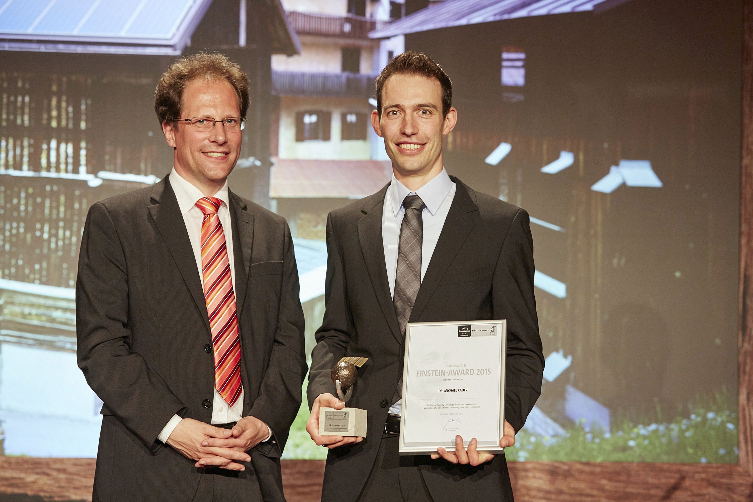 SolarWorld Junior Einstein Award 2015 ceremony, Dr. Holger Neuhaus, chairman of the jury for the SolarWorld Einstein Award (left), prize winner Michael Rauer, Fraunhofer ISE (right). 