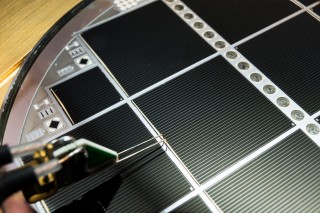 Wafer-bonded III-V / Si multi-junction solar cell with 30.2 percent efficiency.