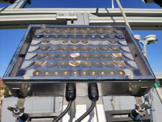 micro-CPV demonstrator module mounted on the tracking unit of the CPV test stand at Fraunhofer ISE. The aperture area of the 10x6 cell-lens unit arrangement is 205 cm².