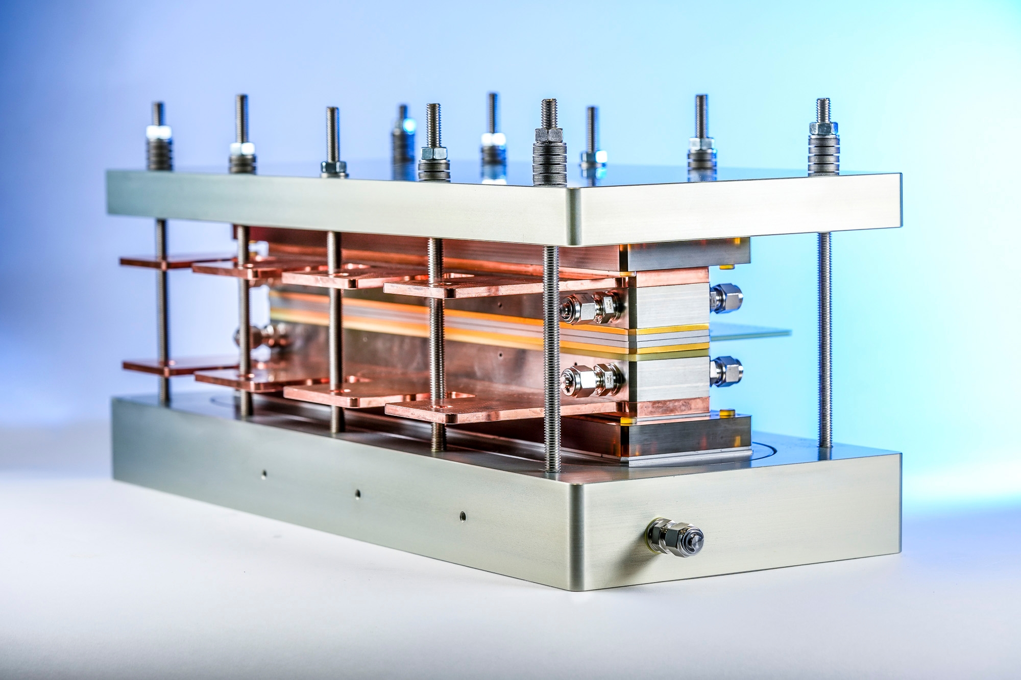 Segmented along the channel test cell for the investigation of locally-resolved mass transport phenomena in PEM electrolysis.